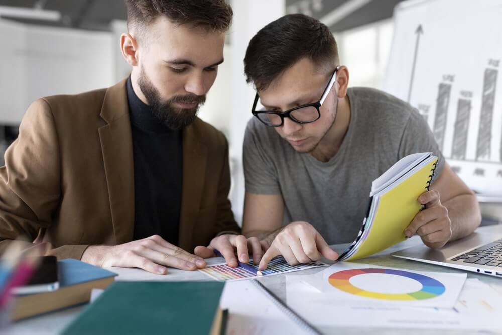 Team researching competitor pricing strategies